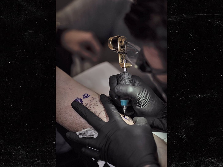 Dillon Forte and Blackdo robot tattoo