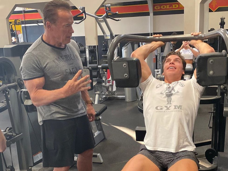 Arnold Schwarzenegger getting pumped at Gold's Gym