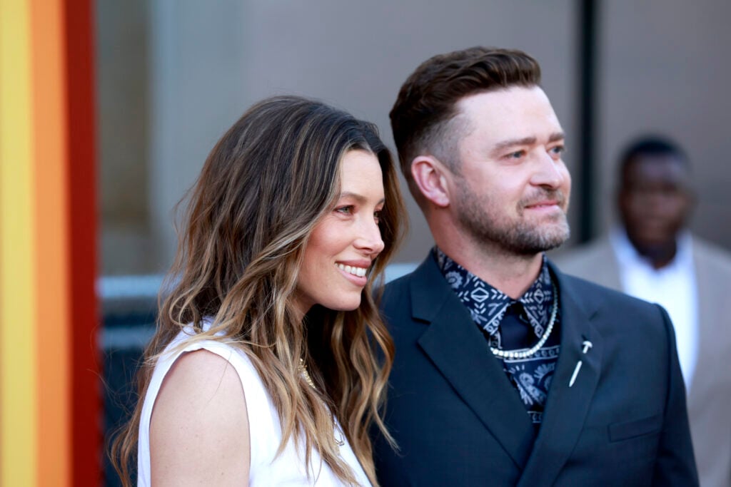 Jessica Biel and Justin Timberlake pose for photographers at a red carpet event.