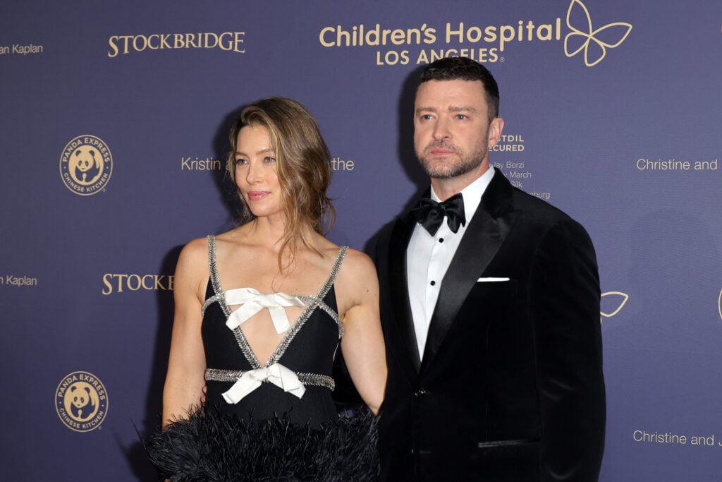 Jessica Biel and Justin Timberlake appear on the red carpet at a charity event.