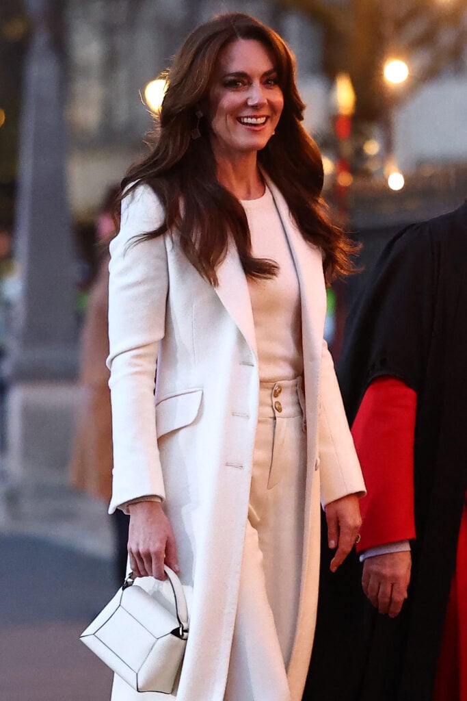 Catherine, Princess of Wales of Great Britain, smiles as she arrives to watch the "Together at Christmas" Carol Service" at Westminster Abbey, London, on December 8, 2023. 