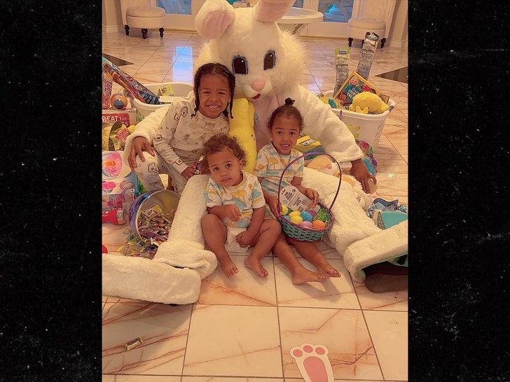 Nick Cannon and 3 kids at Easter