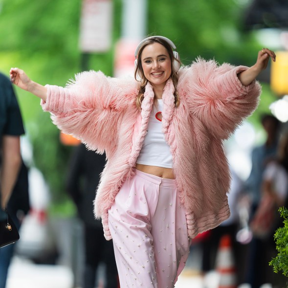 FEATHER WEATHER: In Tribeca, Suki Waterhouse rocks during a Sonos commercial shoot.