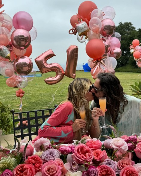 IN FULL KLUM: Heidi Klum celebrates turning 51 with a kiss. 