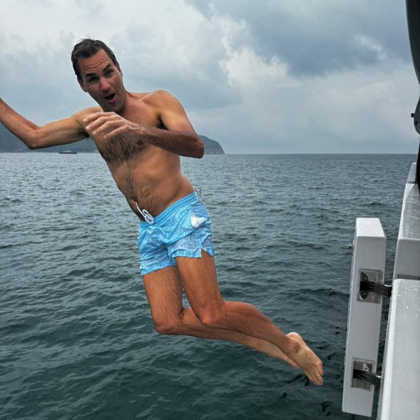 DROP SHOT: Abroad in Asia, Roger Federer takes a dip in the South China Sea.