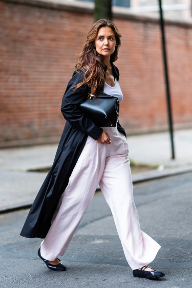 TRENCH THOROUGHFARE: Katie Holmes takes inspiration from New York's famous black and white cookie in Soho.