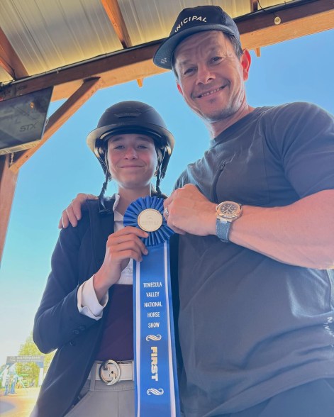 WORKING: Mark Wahlberg is a proud dad after daughter Grace, 14, wins first place ribbon at a California horse show.