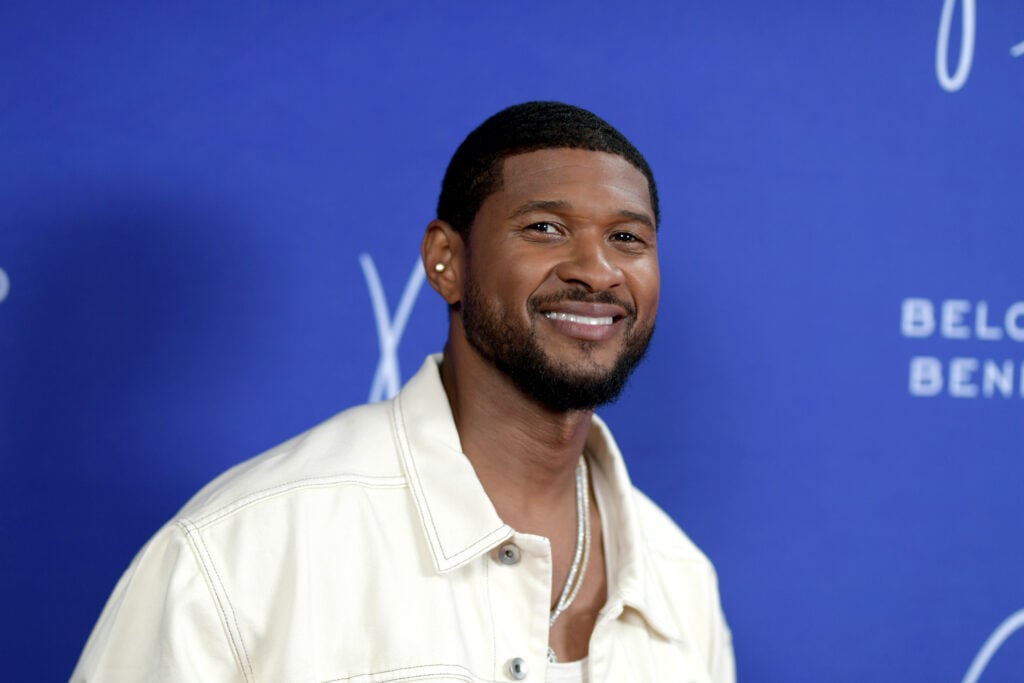 Usher attends the 2022 Beloved Benefit at Mercedes-Benz Stadium on July 7, 2022 in Atlanta, Georgia. 