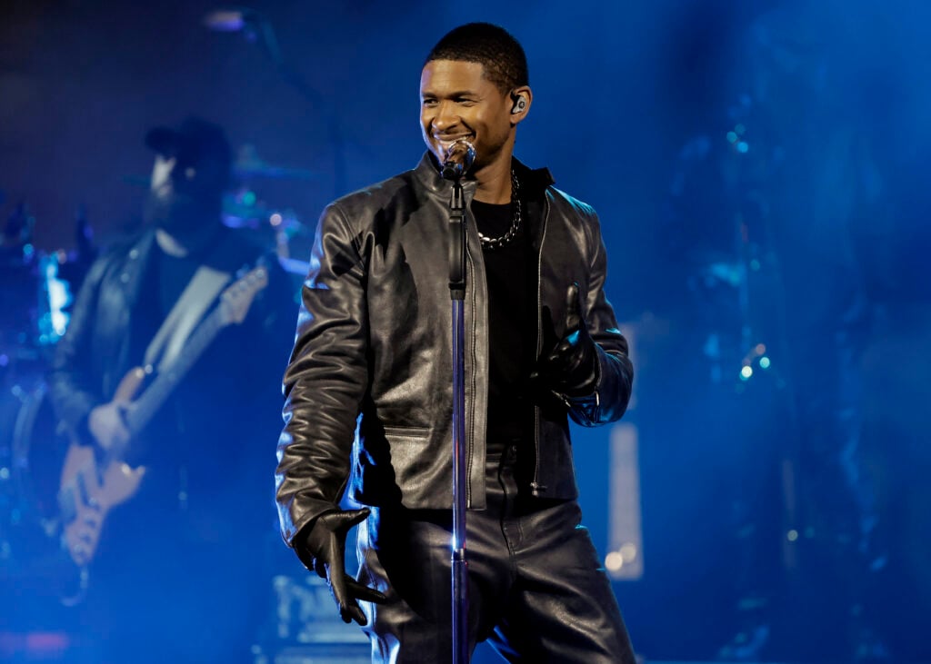 Usher performs on stage during a taping of iHeartRadio's Living Black 2023 Block Party in Inglewood, California. 