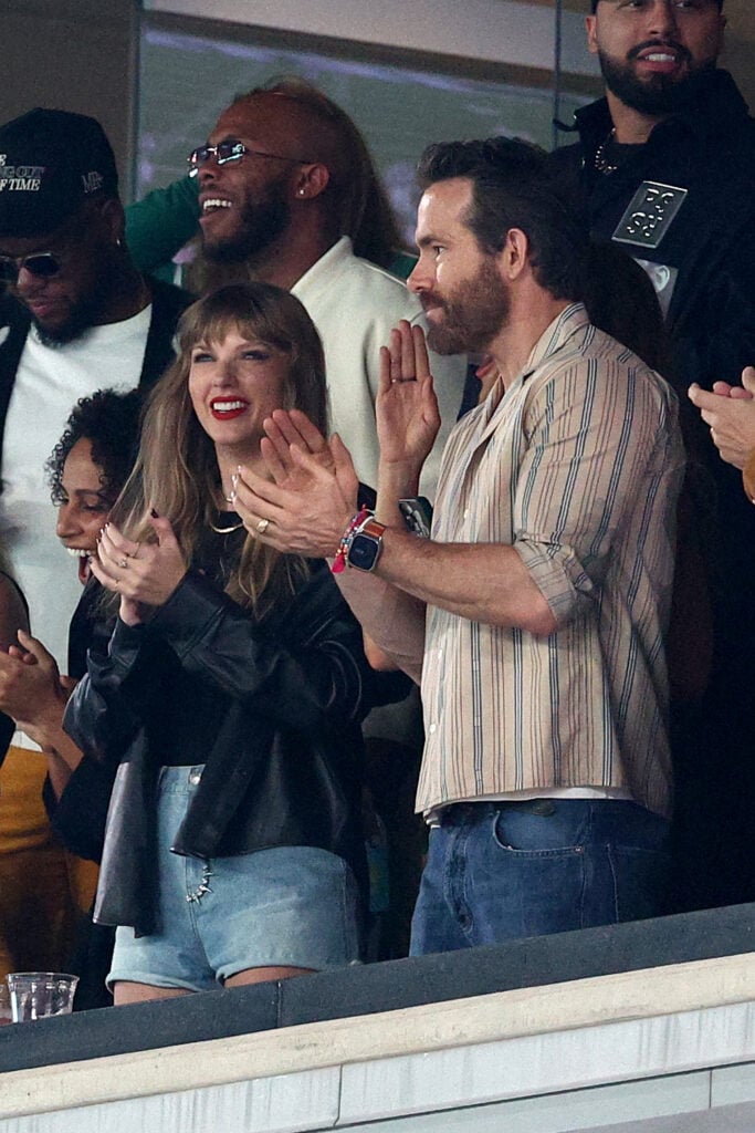 Taylor Swift and Ryan Reynolds attend a sports game in October 2023.