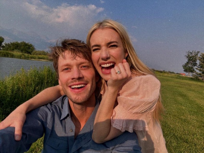 Emma Roberts showing off her engagement ring with Cody John 