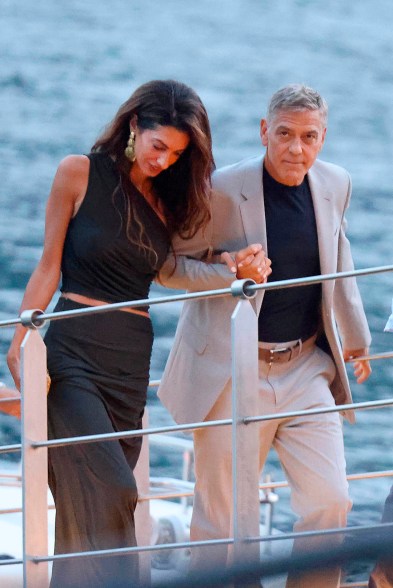 LOVE BOAT LANDING: Amal and George Clooney recover well after a boat trip on Lake Como, Italy.