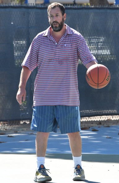 IN THE SHORT TERM: Adam Sandler takes his style from the streets to the courts in Santa Monica, California.