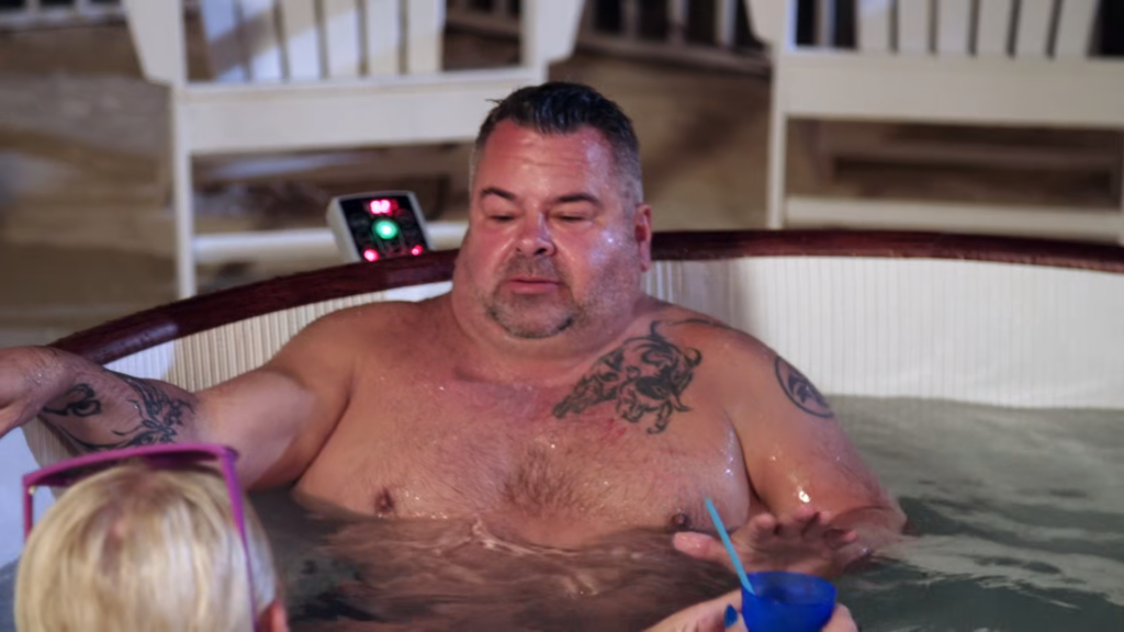 An unreasonable Big Ed Brown in a hot tub.