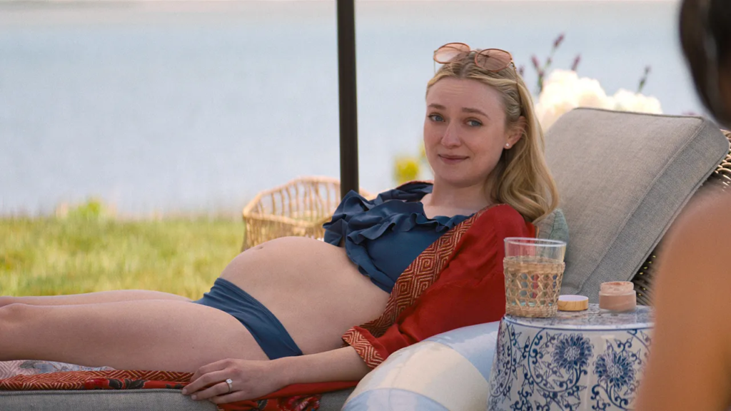 Dakota Fanning cradles her pregnant belly in The Perfect Couple. It was a prosthetic.