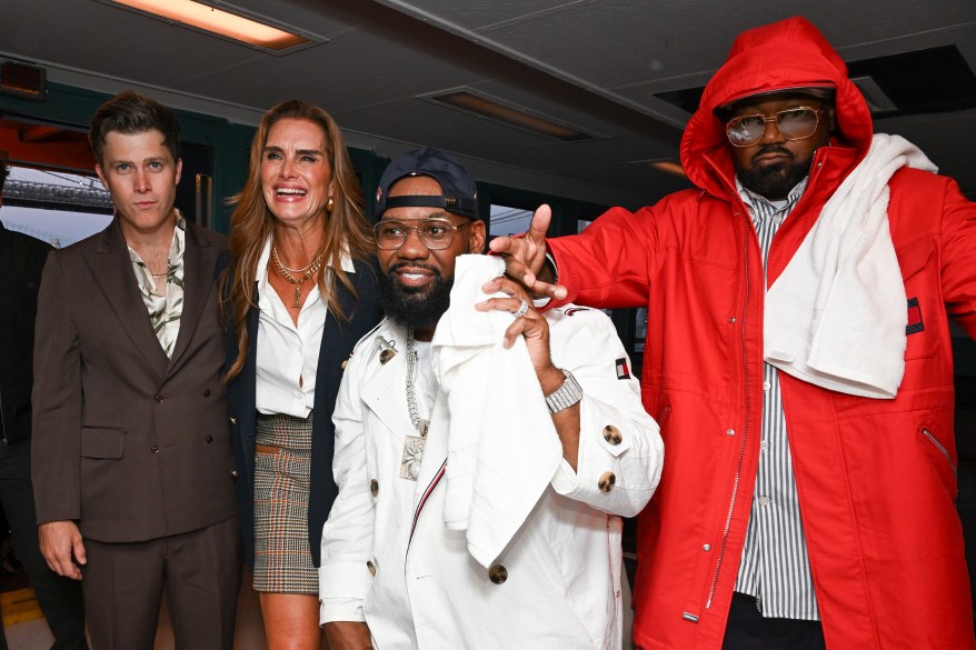 FASHION STARS: Colin Jost (left to right), Brooke Shields, Raekwon and Ghostface Killah keep it stylish at the Tommy Hilfiger NYFW show.