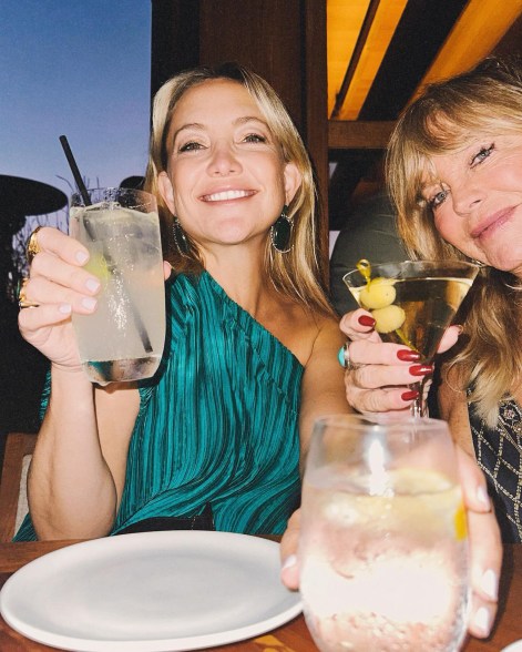 FROM DUSK TILL DAWN: Kate Hudson (left) and mother Goldie Hawn toast their brother and son Oliver's 48th birthday.