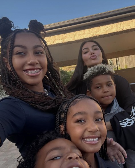 FULL HOUSE OF KARDS: Kim Kardashian (top right) enjoys some quality time with North (clockwise), 11, Saint, 8, Chicago, 6, and Psalm, 5, before school starts.