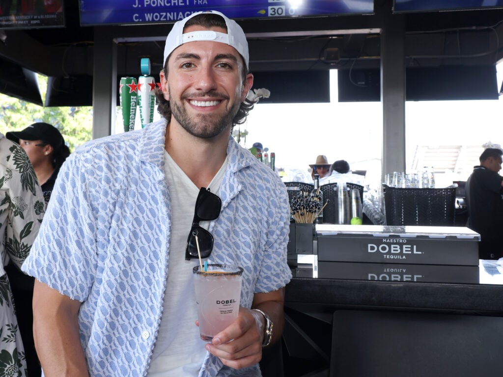 Jason Tartick enjoys a Dobel Tequila Ace Paloma at the Dobel Tequila Club at the 2024 US Open on August 31, 2024 in New York City. 