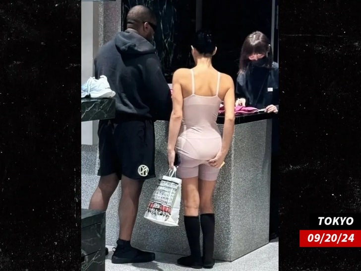 Kanye and Bianca on the street in Tokyo